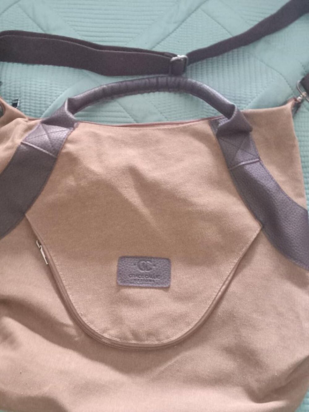 Grace Callie crossbody starp and hand grip bag.